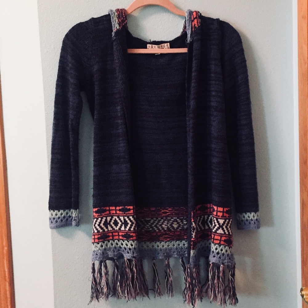 Colorful girls cardigan with pretty details.